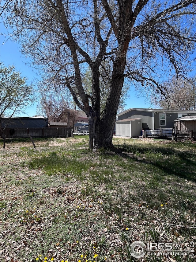 view of yard featuring a wooden deck