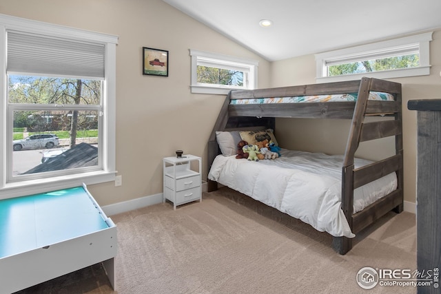 carpeted bedroom featuring recessed lighting, baseboards, and vaulted ceiling