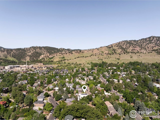 birds eye view of property featuring a mountain view