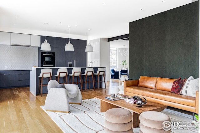 living room featuring light wood-style flooring