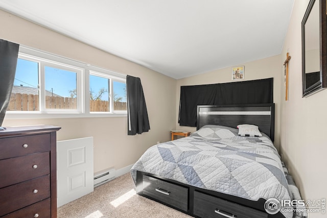 bedroom featuring light colored carpet, lofted ceiling, a baseboard heating unit, and multiple windows