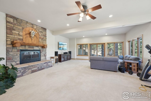 living area featuring recessed lighting, carpet flooring, ceiling fan, and a fireplace