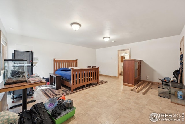 bedroom with baseboards