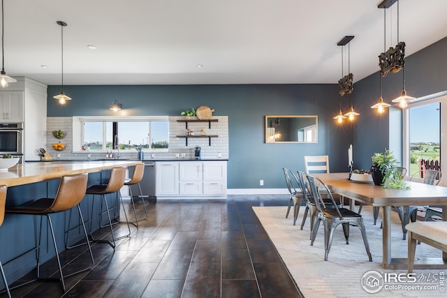 dining room featuring dark wood-type flooring