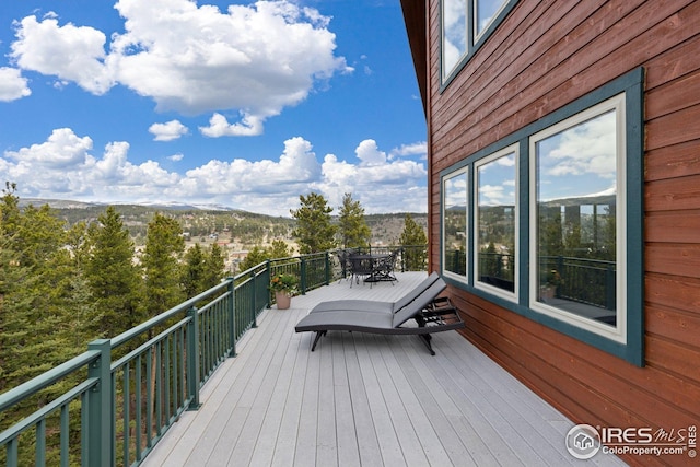 deck featuring outdoor dining space