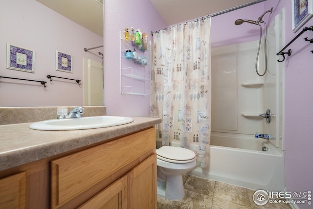 full bathroom with vanity, toilet, and shower / tub combo