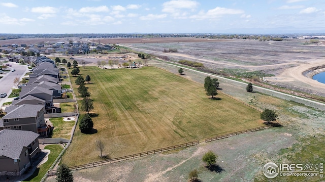 birds eye view of property featuring a rural view and a residential view