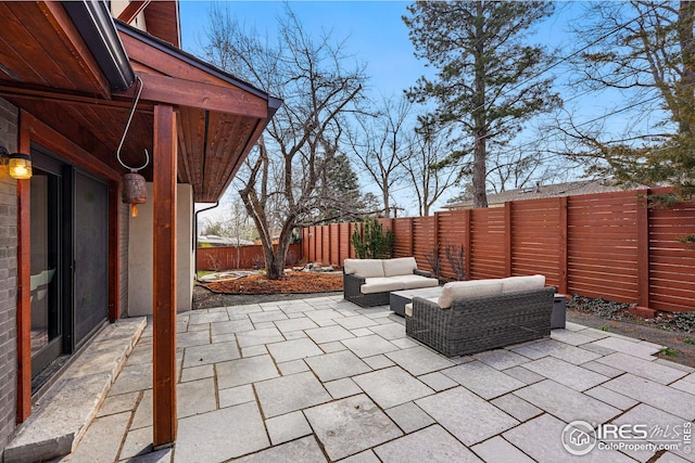 view of patio / terrace featuring a fenced backyard and an outdoor hangout area
