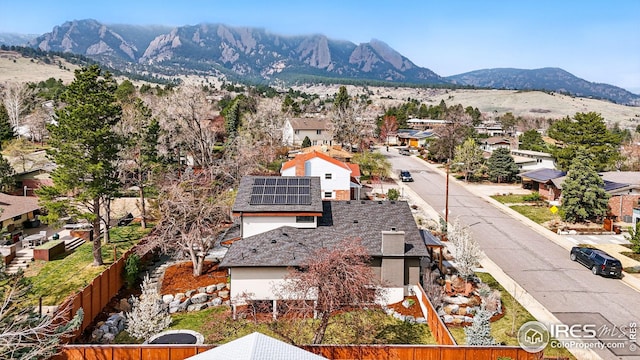 drone / aerial view featuring a mountain view and a residential view
