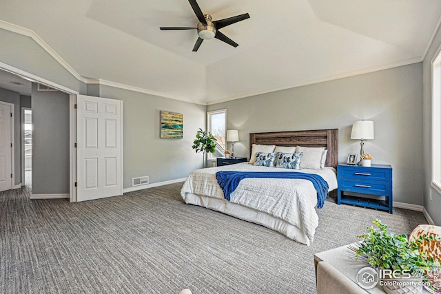 bedroom with vaulted ceiling, visible vents, baseboards, and carpet
