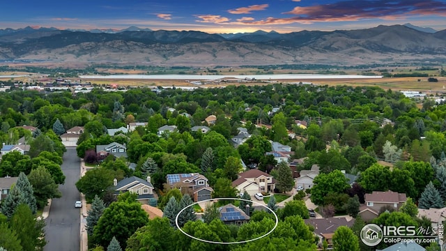 aerial view at dusk with a mountain view