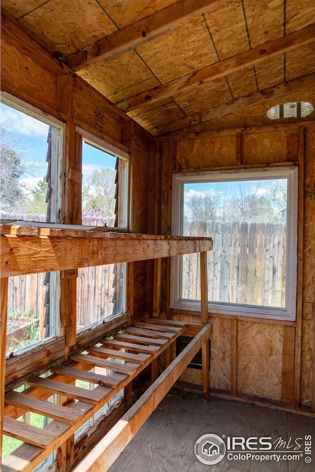 interior space featuring wood-type flooring and a wealth of natural light