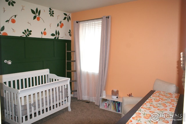 245 Swallow Rd, Johnstown, CO 80534 - bedroom featuring a crib and carpet floors