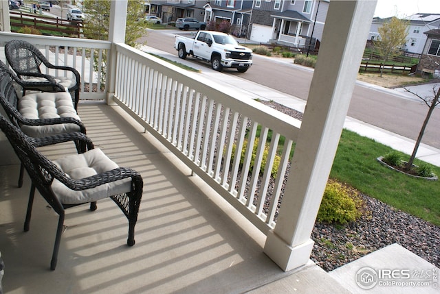 245 Swallow Rd, Johnstown, CO 80534 - porch featuring a residential view