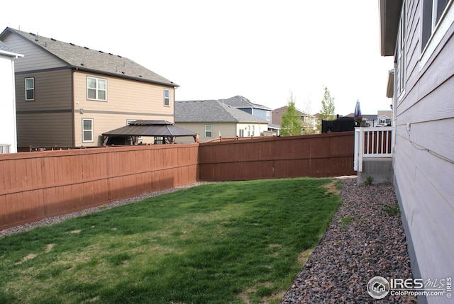 245 Swallow Rd, Johnstown, CO 80534 - view of yard featuring a gazebo and a residential view