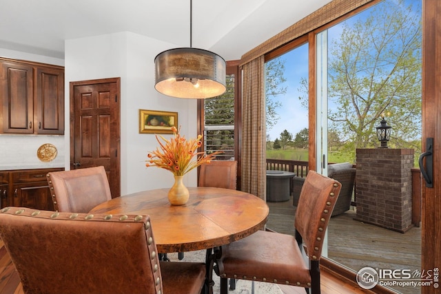 dining area with light wood-style flooring