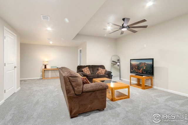 carpeted living area featuring baseboards, a ceiling fan, recessed lighting, and visible vents