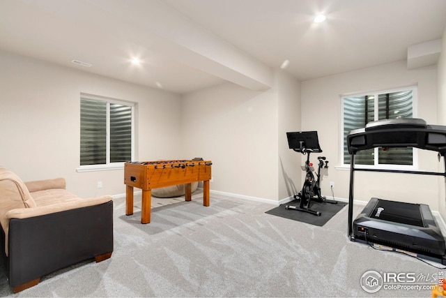 game room featuring baseboards and carpet floors