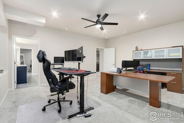 office with baseboards, a ceiling fan, recessed lighting, and light carpet