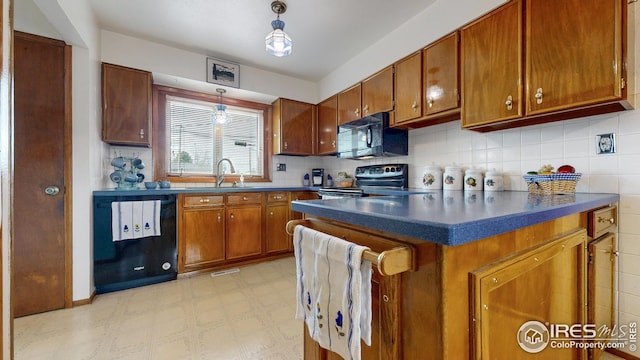 kitchen featuring a sink, light floors, black appliances, and brown cabinets