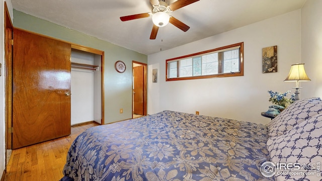 bedroom featuring a closet, ceiling fan, and wood finished floors