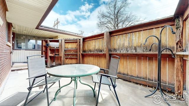 view of patio featuring outdoor dining space