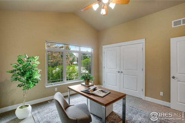 home office featuring visible vents, carpet floors, baseboards, high vaulted ceiling, and a ceiling fan