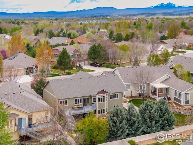 bird's eye view with a residential view and a mountain view