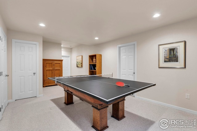 game room featuring recessed lighting, baseboards, and light carpet
