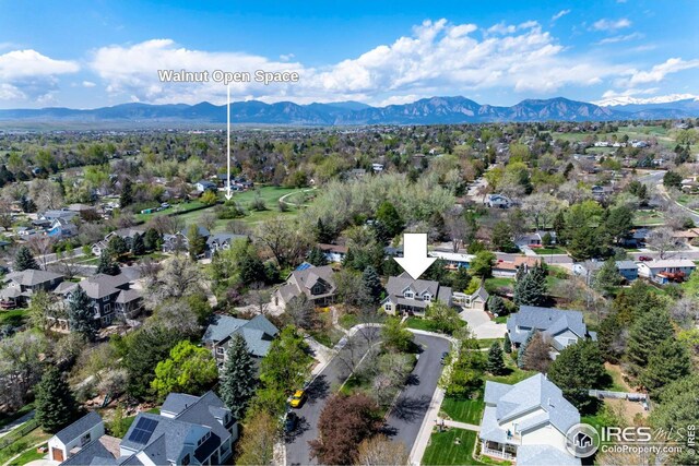 drone / aerial view featuring a mountain view and a residential view