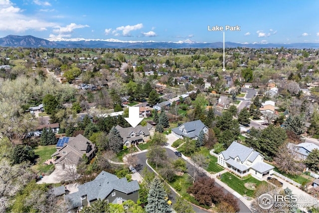 bird's eye view featuring a residential view and a mountain view