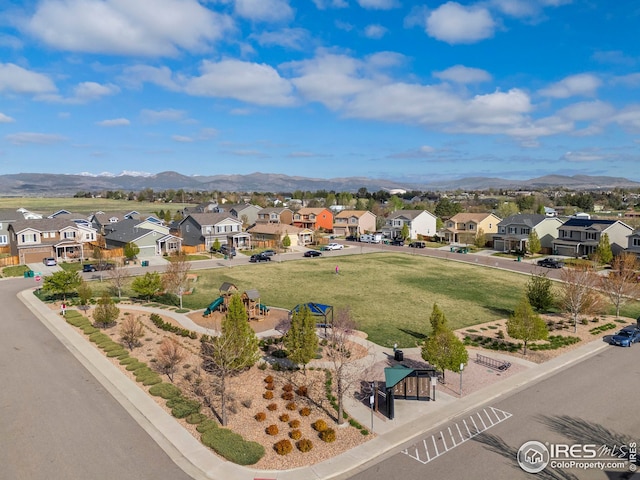 bird's eye view with a residential view and a mountain view