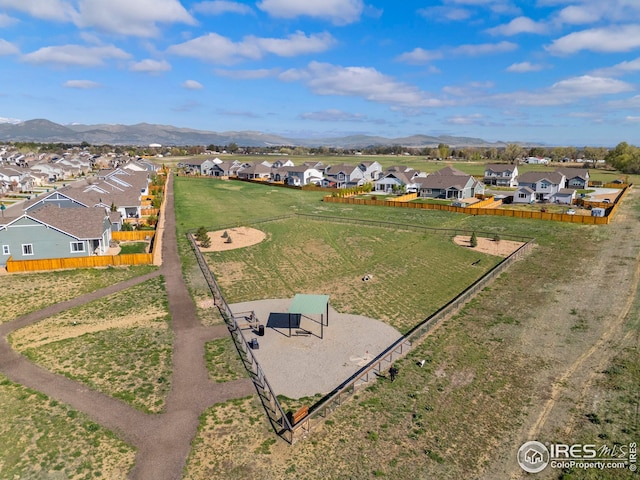 bird's eye view with a residential view and a mountain view