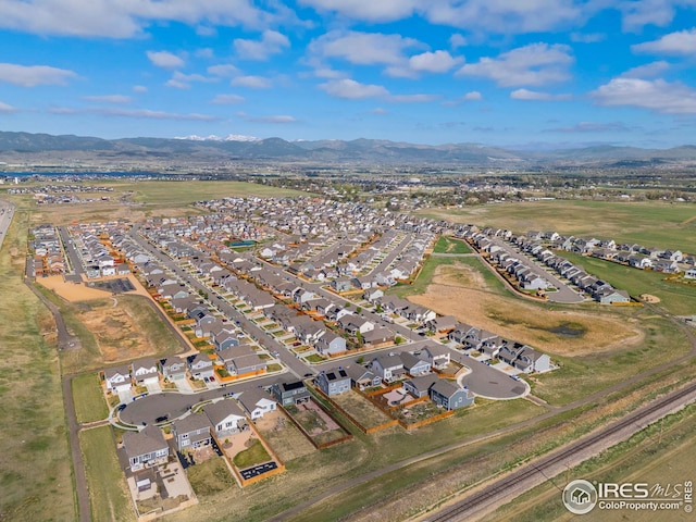aerial view with a mountain view and a residential view