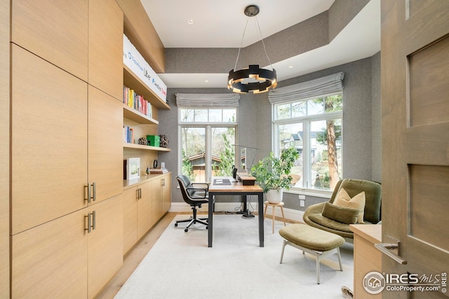 office area featuring recessed lighting, baseboards, a chandelier, and built in shelves