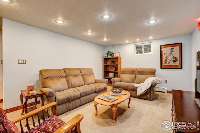 carpeted living room featuring recessed lighting, a textured ceiling, and a baseboard heating unit