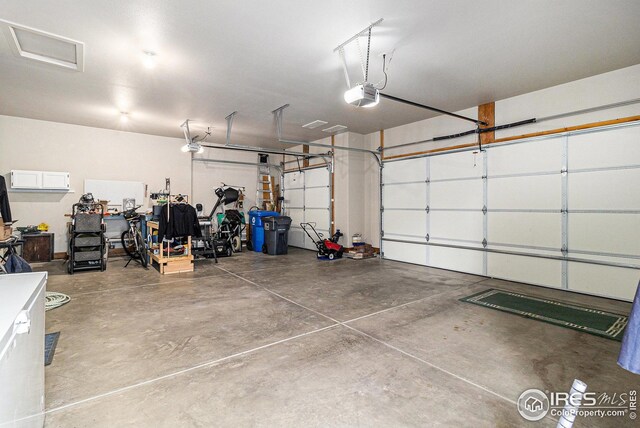 garage featuring a garage door opener