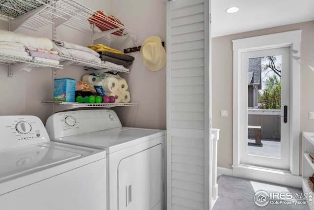 clothes washing area featuring separate washer and dryer, laundry area, carpet flooring, and recessed lighting