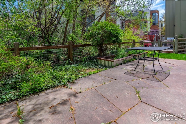 view of patio / terrace with fence and outdoor dining area