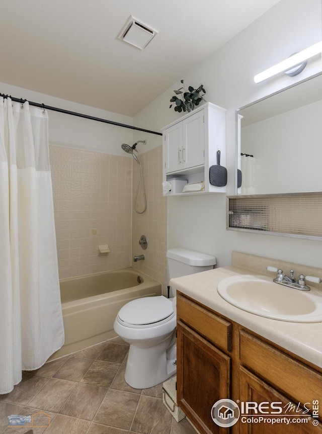 full bathroom with toilet, visible vents, shower / tub combo, and vanity