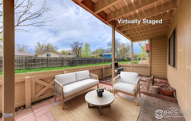 view of patio / terrace with a fenced backyard and outdoor lounge area