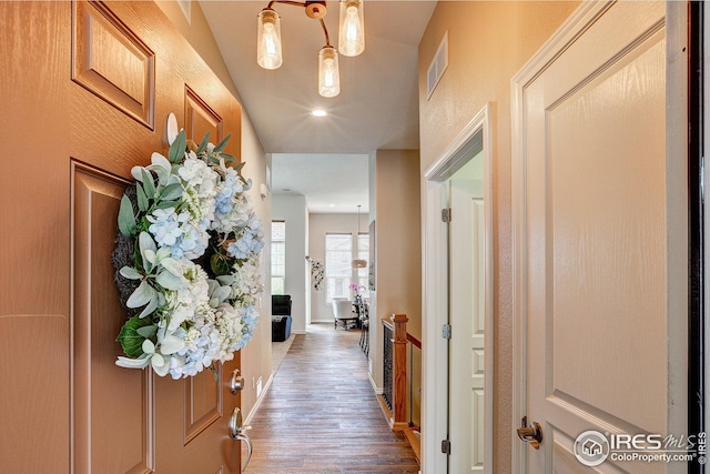 entrance foyer featuring visible vents, recessed lighting, baseboards, and wood finished floors