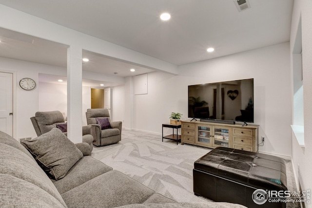 carpeted living area featuring baseboards, recessed lighting, and visible vents