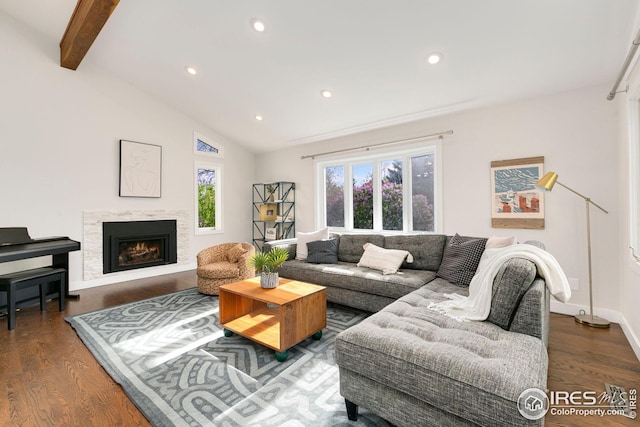living area featuring vaulted ceiling with beams, recessed lighting, and wood finished floors