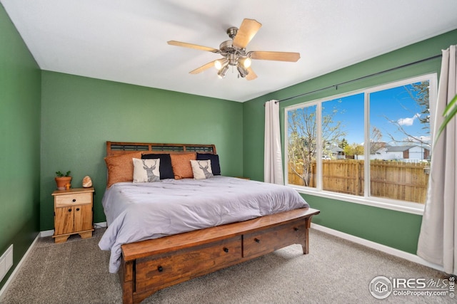 8596 Seattle Slew Ln, Wellington, CO 80549 - bedroom with baseboards, ceiling fan, and carpet