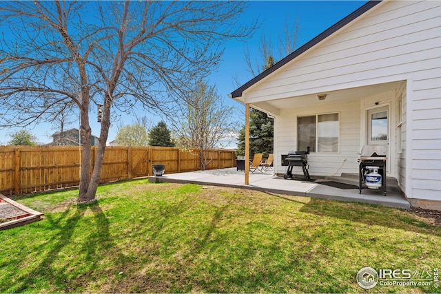 8596 Seattle Slew Ln, Wellington, CO 80549 - view of yard featuring a fenced backyard and a patio area