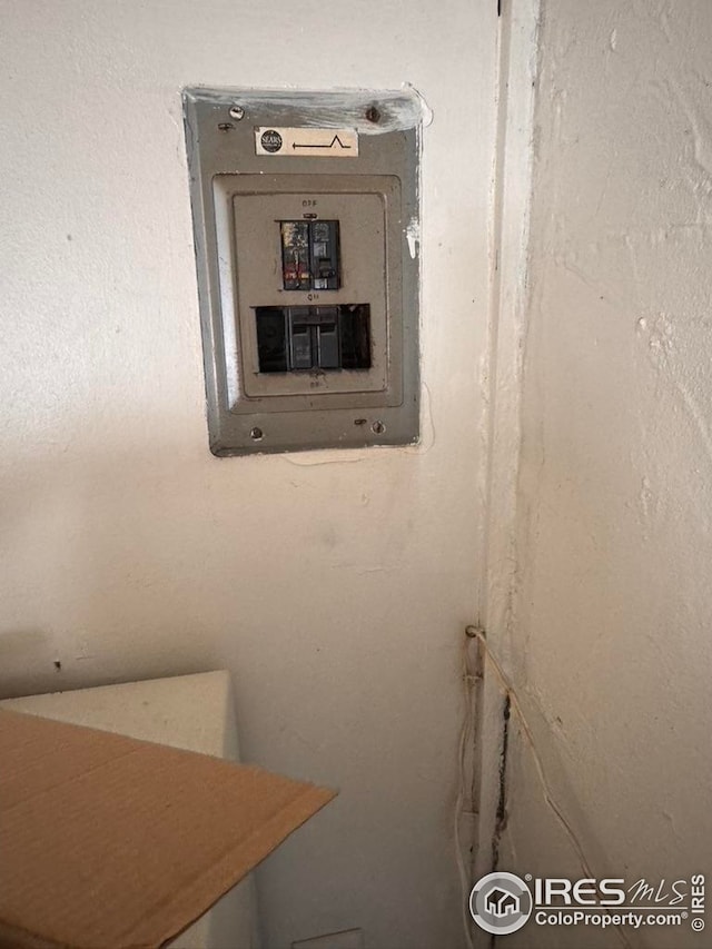 utility room featuring electric panel