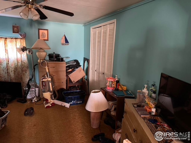 office space with carpet flooring and ceiling fan