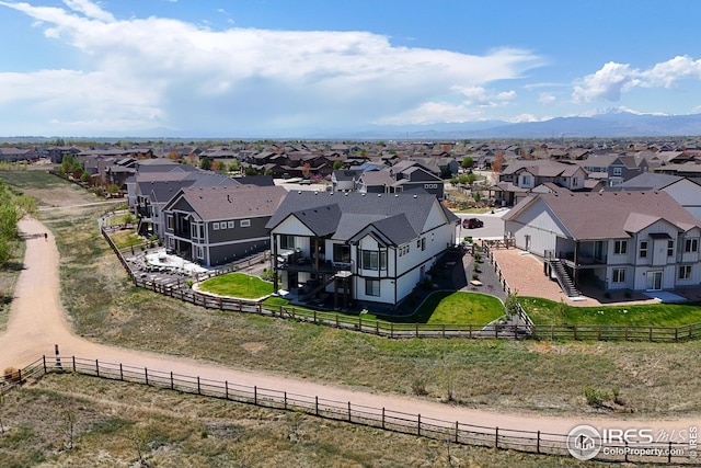 aerial view with a residential view and a mountain view