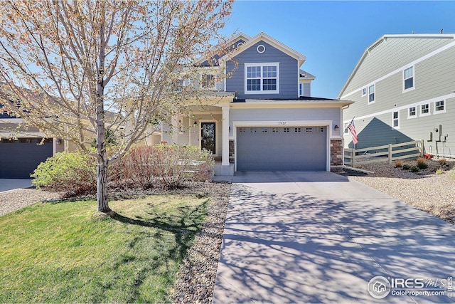view of front facade featuring an attached garage, fence, driveway, and stone siding